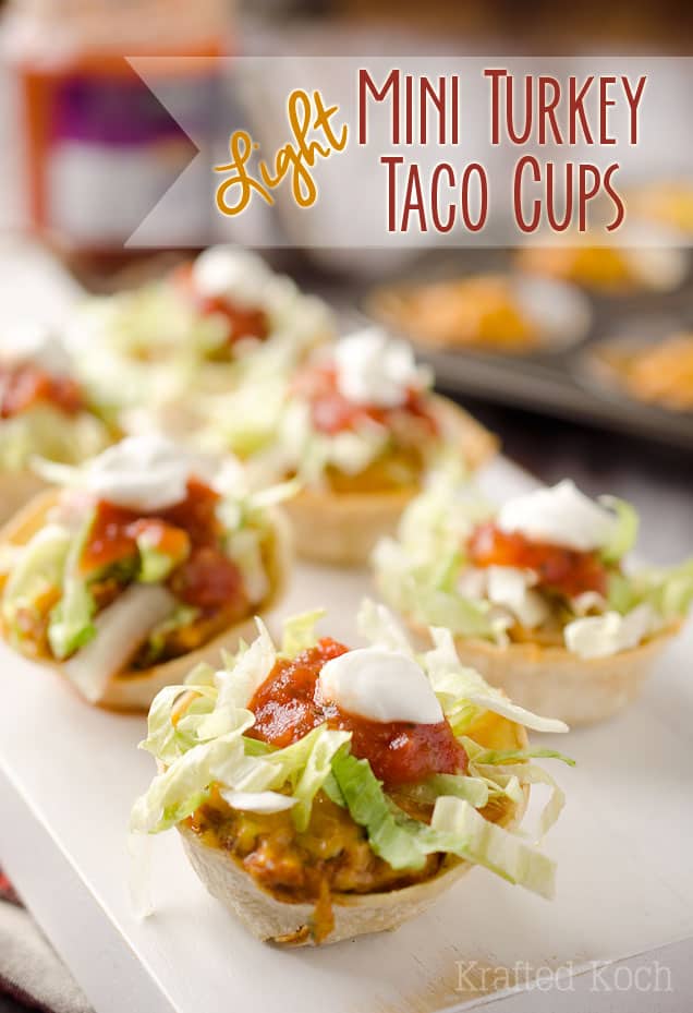 Light Mini Turkey Taco Cups - Lavibu - Tortilla cups filled with taco seasoned turkey and topped with lettuce, salsa and sour cream for the perfect healthy appetizer recipe! #Healthy #Appetizer #Light #Lunch
