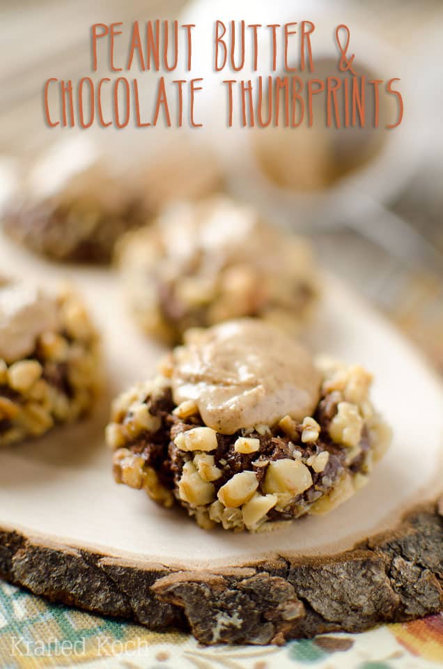 Peanut Butter & Chocolate Thumbprint Cookies - Lavibu - A rich chocolate cookie recipe rolled in walnuts and filled with sweet peanut butter frosting for the perfect cookie! #Cookie #Recipe #PeanutButter #Chocolate