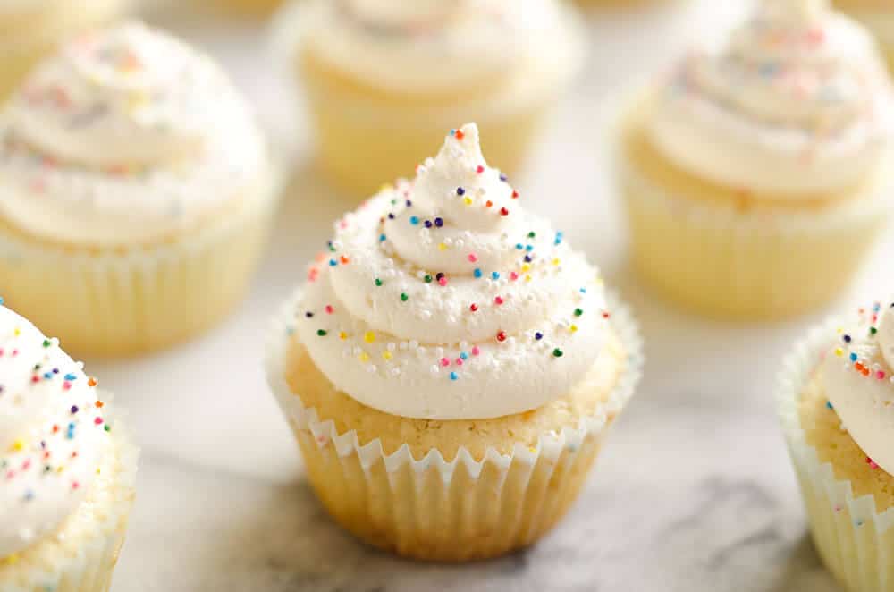 Best Birthday Cupcakes are the perfect dessert recipe for your special celebration! A moist vanilla homemade cake is topped with rich whipped buttercream for a sweet treat everyone will love.