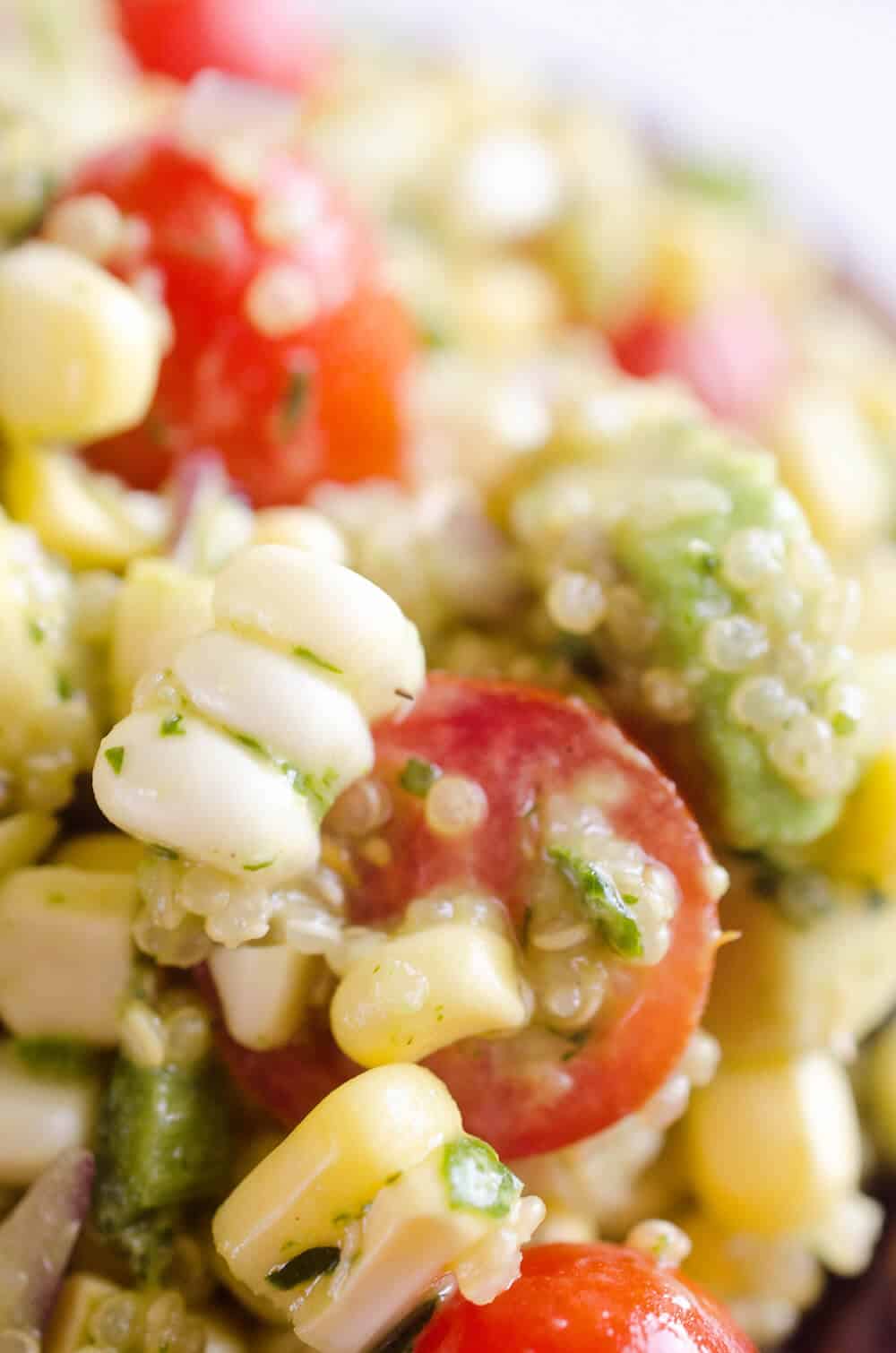 Cilantro Quinoa Corn Salad is a light and refreshing salad perfect for an easy packed lunch or a side salad for a cookout. This salad is a healthy combination of quinoa, corn, avocado and a light Cilantro Lemon dressing with a kick of spice from fresh jalapeños for a dish you will love!