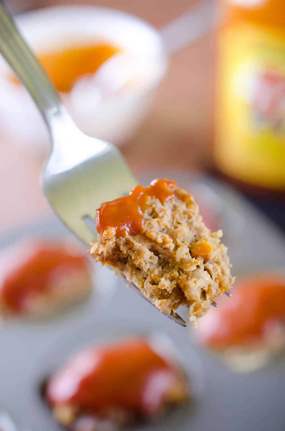 Skinny Mini Zesty Meatloaves are a healthy and wholesome dinner full of hidden vegetables. A tender recipe for meatloaf is topped with an easy and zesty mixture of ketchup and Heinz 57 for a unique take on a classic.