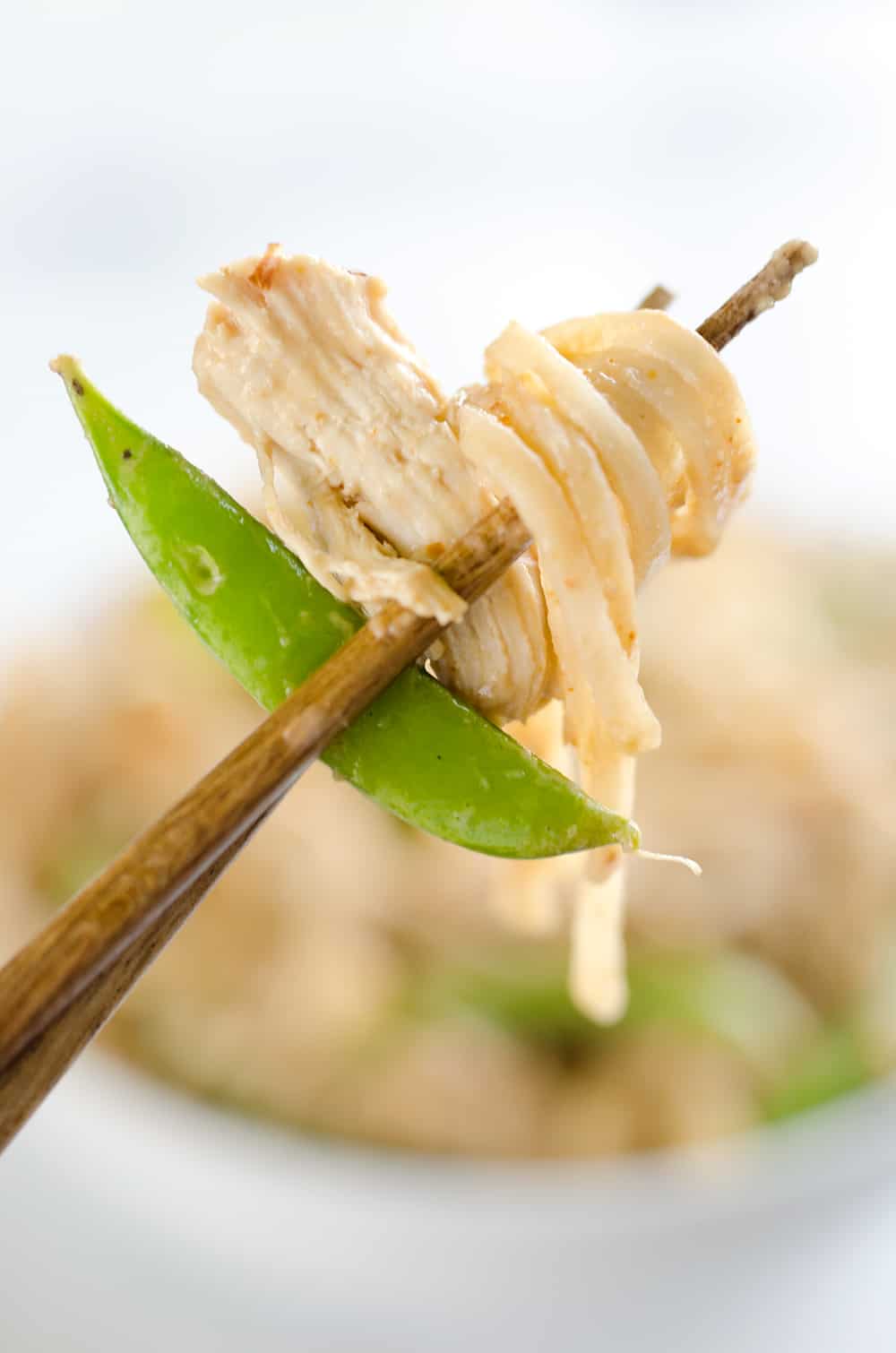 Pressure Cooker Thai Peanut Chicken & Noodles is the best 30 minute Pressure Cooker recipe you will find! Lean chicken breasts are cooked in a homemade spicy Thai peanut sauce and finished off with rice noodles and peas for an easy and healthy one-pot meal made in your Instant Pot.