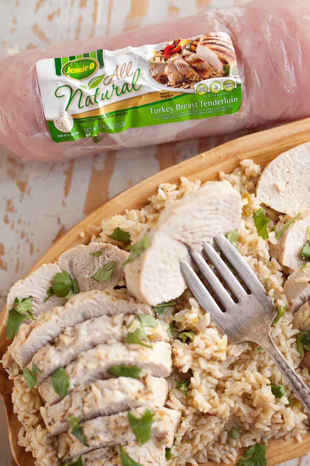 Pressure Cooker Turkey Verde & Rice is an easy 30 minute recipe made in your Instant Pot with only five ingredients! This healthy dinner idea is loaded with turkey tenderloins, salsa verde and brown rice for a quick and delicious meal you will love.