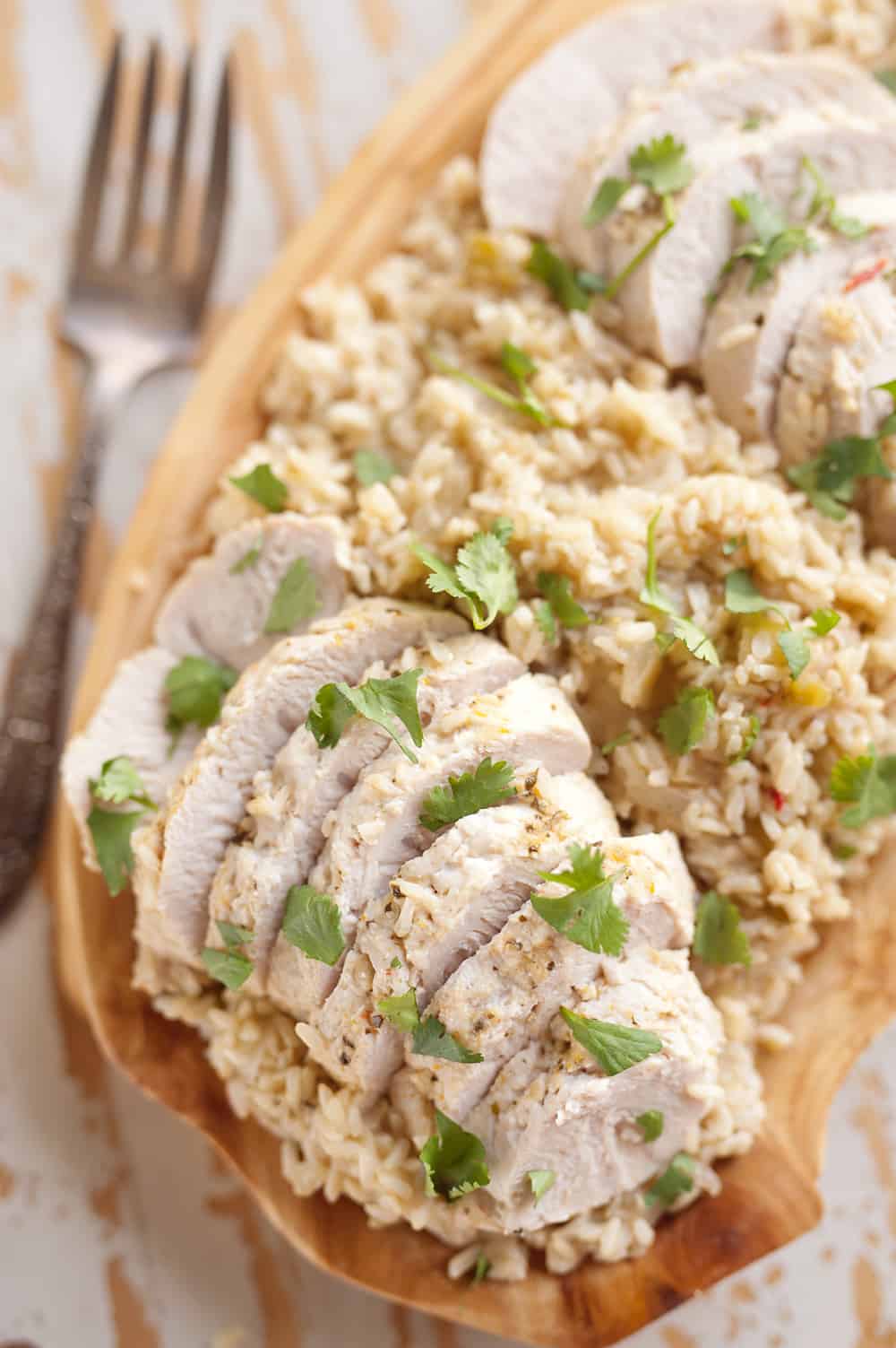 Pressure Cooker Turkey Verde & Rice is an easy 30 minute recipe made in your Instant Pot with only five ingredients! This healthy dinner idea is loaded with turkey tenderloins, salsa verde and brown rice for a quick and delicious meal you will love.