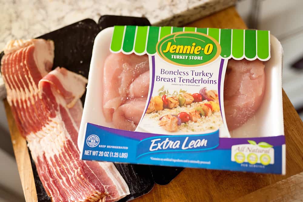 Sweet & Spicy Bacon Wrapped Turkey Tenders are a delicious appetizer paired with a homemade honey mustard for the ultimate game day finger food! They also make a great dinner idea with a side of rice and veggies.