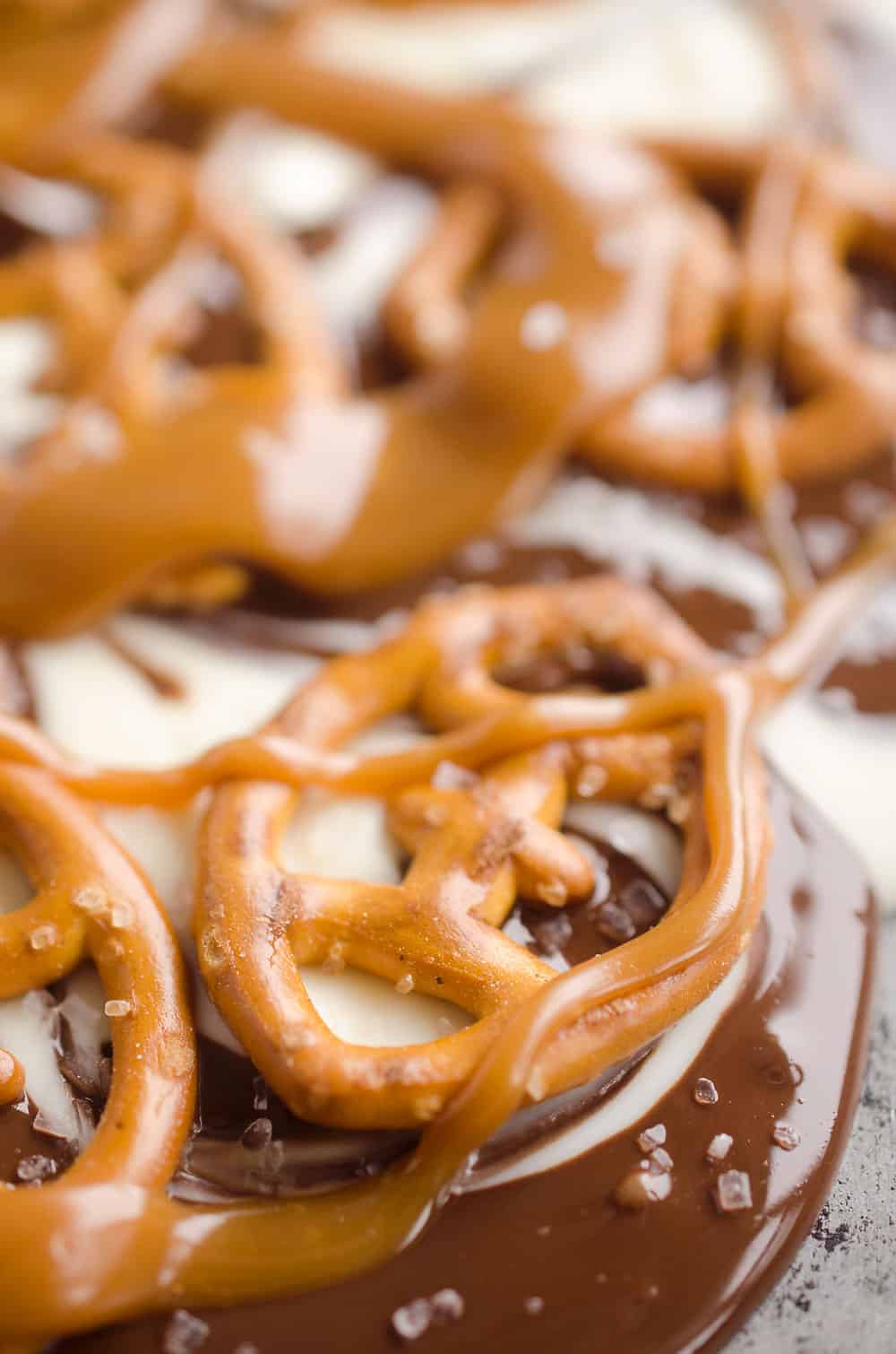 Salted Caramel & Pretzel Chocolate Bark is an easy and delicious sweet & salty dessert to add to your next party snack table! It's perfect for a game day sweet while watching football or a holiday treat.