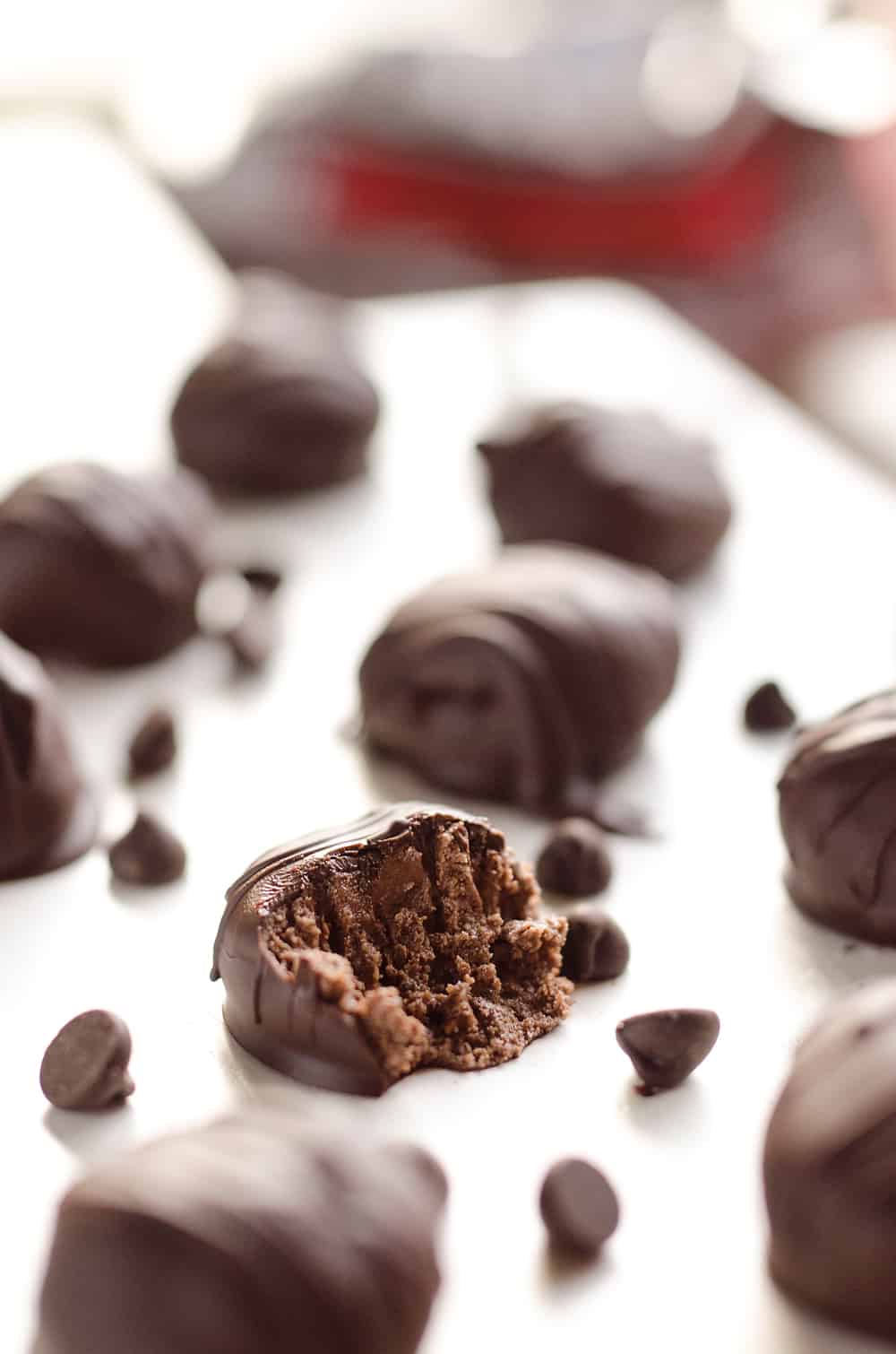 Protein Dark Chocolate Truffles are an easy and delicious treat made with protein powder and dark chocolate peanut butter for a healthy snack that tastes amazingly decadent!