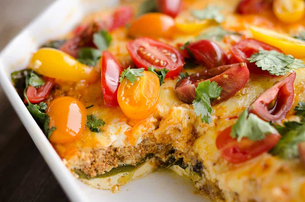Roasted Poblano & Chorizo Egg Casserole is a low-carb breakfast recipe perfect for brunch or dinner! Fire roasted peppers are layered with spicy Chorizo and Mexican cheeses for a healthy egg bake bursting with bold flavors.