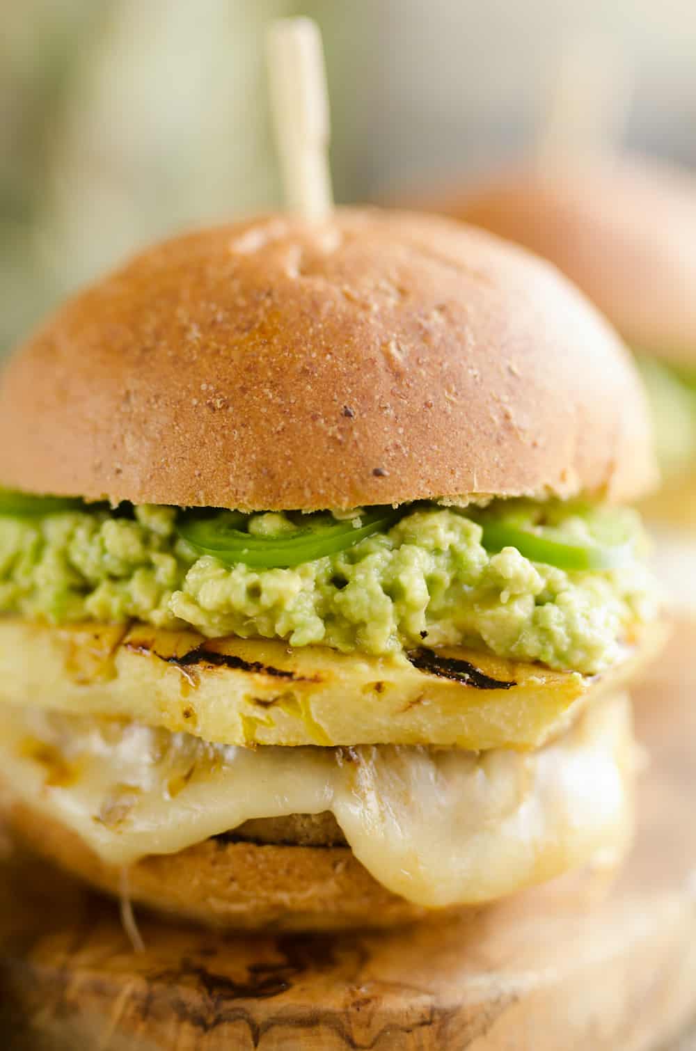 Grilled Pineapple & Guacamole Turkey Burger is a healthy and easy recipe made on the grill! Juicy Jennie-O Turkey Burgers are topped with pepperjack cheese, sweet grilled pineapple, guacamole and fresh jalapeños for a zesty burger perfect for any grill out.