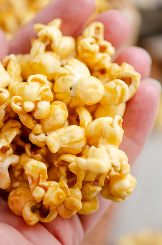Microwave Caramel Popcorn in hand