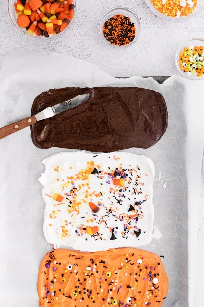 Halloween Ghost Bark spread out on parchment paper