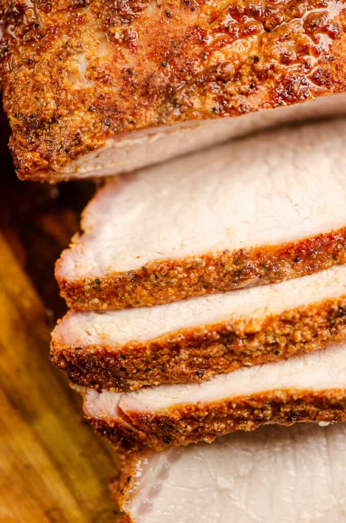 sliced of pork loin on cutting board