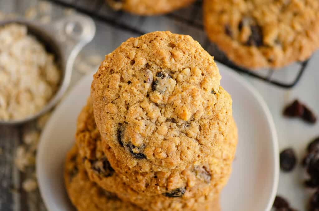 oatmeal raisin cookies stacked on small plate
